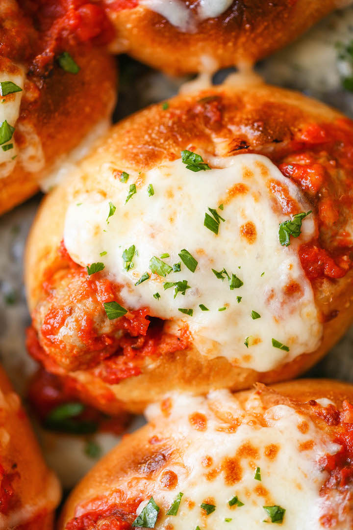 Mini Italian Meatball Subs - Tender, melt-in-your-mouth (make-ahead!) meatballs stuffed into mini subs. Makes for easy serving, sharing and portion control!