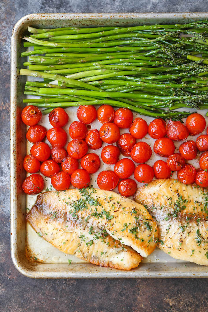 Sheet Pan Garlic Butter Tilapia - 30 min. ONE sheet pan. Done and done. With the butteriest, flakiest fish ever! With roasted asparagus and cherry tomatoes.