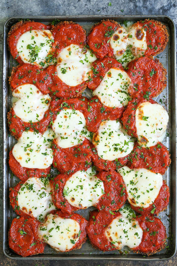 Sheet Pan Zucchini Parmesan - Everyone's favorite chicken parmesan except made HEALTHIER! Use zucchini instead baked to perfection with marinara and cheese!