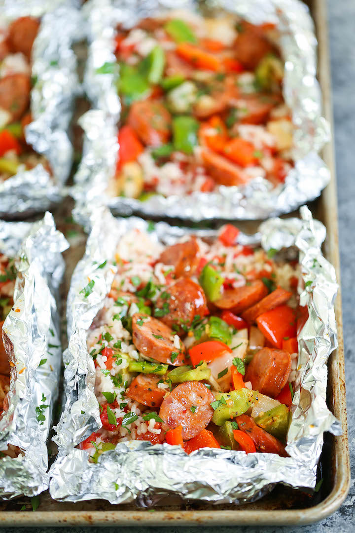 Sausage and Peppers Foil Packets - Prep ahead of time and portion these into individual servings! Loaded with sausage, peppers, rice and cajun seasoning!!!