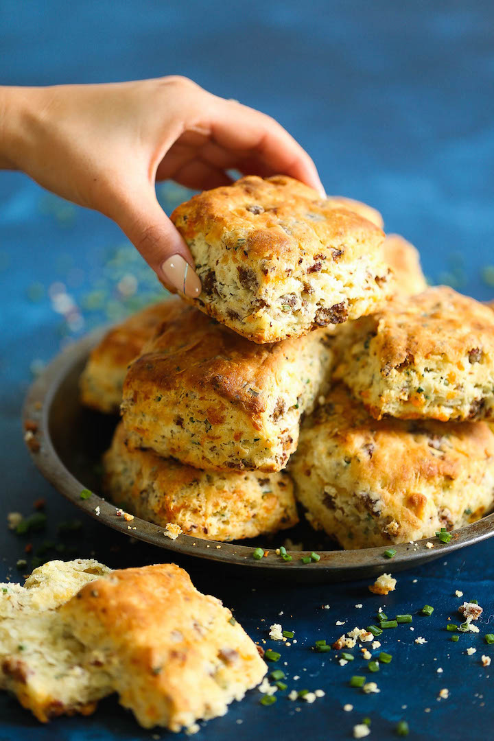 Sausage Cheese Biscuits - The most amazing breakfast biscuits ever! Loaded with fresh crumbled sausage chunks, sharp cheddar cheese and green onions. You will want this for breakfast every single morning!