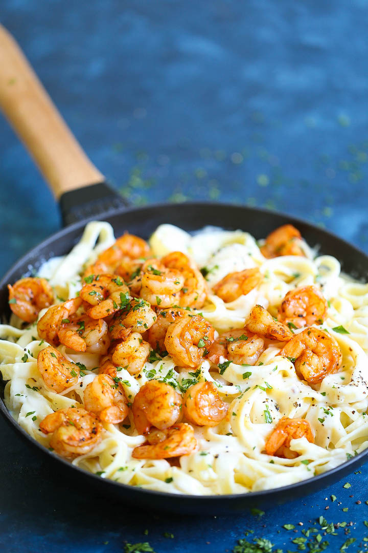 Shrimp Alfredo Fettuccine - Easy peasy weeknight alfredo made completely from scratch, made in 35 min or less! With the creamiest alfredo sauce ever with perfectly flavored, tender shrimp! This is comfort food at its best (and easiest!).