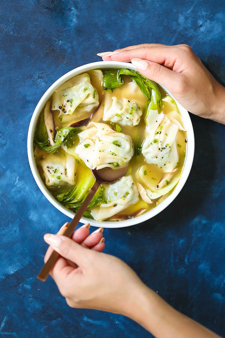 Chicken Wonton Soup - Cozy, comforting wonton soup just like your favorite takeout place! No need to be intimidated here. This recipe is so quick and easy, and the chicken wontons are packed with so much flavor! Nothing beats homemade, right?