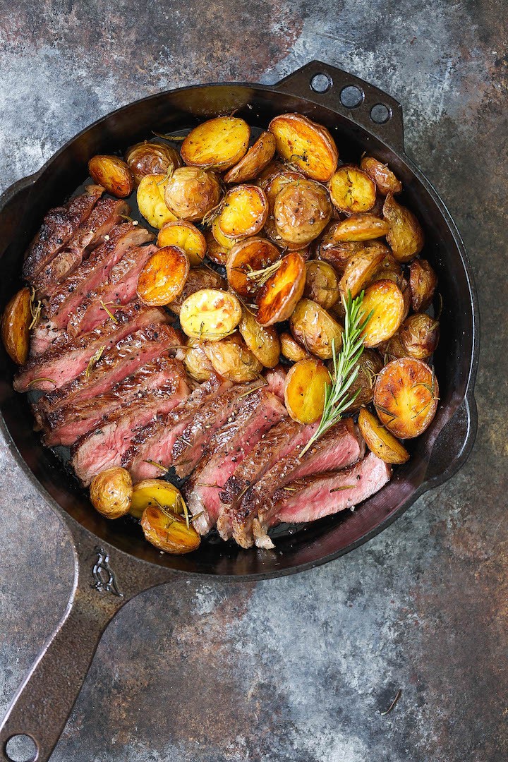 Skillet Steak with Rosemary Roasted Potatoes - The BEST and easiest 5 ingredient dinner ever! With perfectly golden brown, crisp, rosemary roasted potatoes and the most amazing buttery skillet steak!