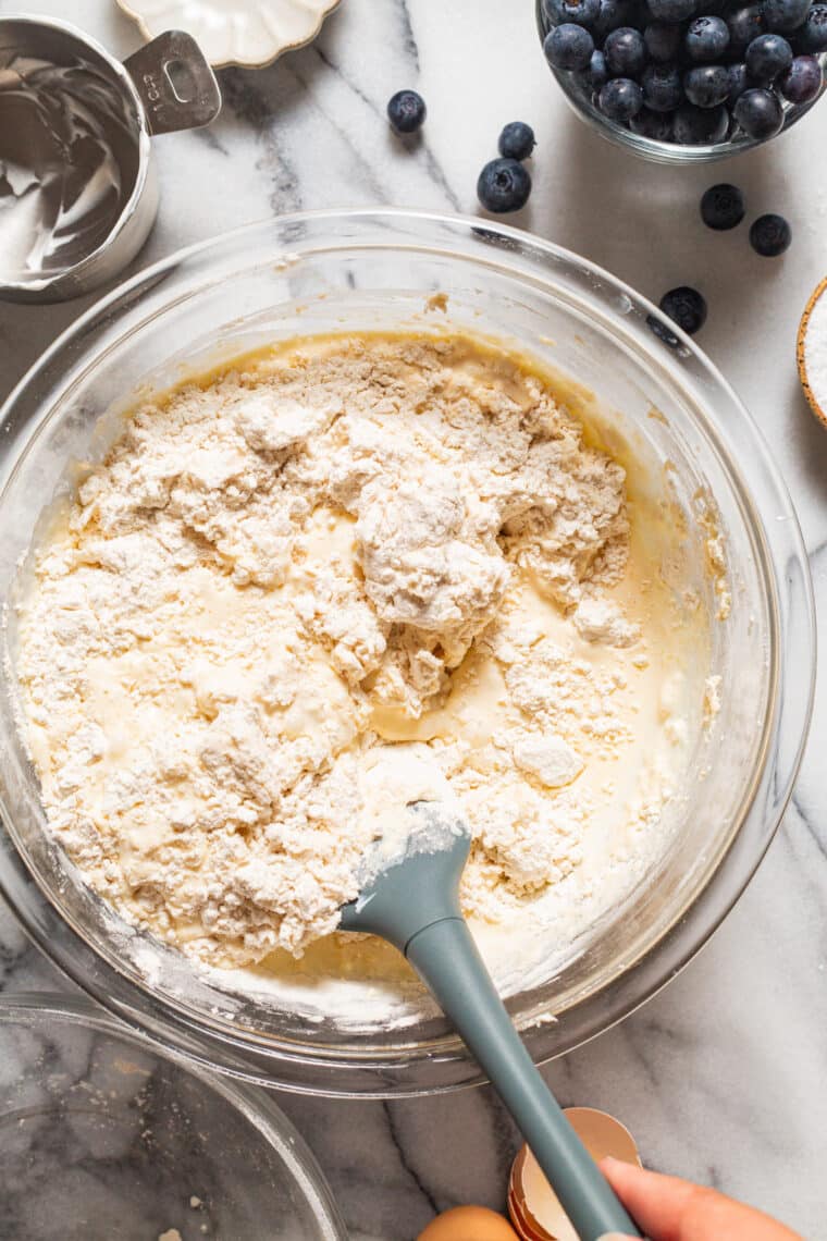 Blueberry Sour Cream Pancakes - Light, fluffy, melt-in-your-mouth buttery pancakes with juicy blueberries. Restaurant-quality right at home!