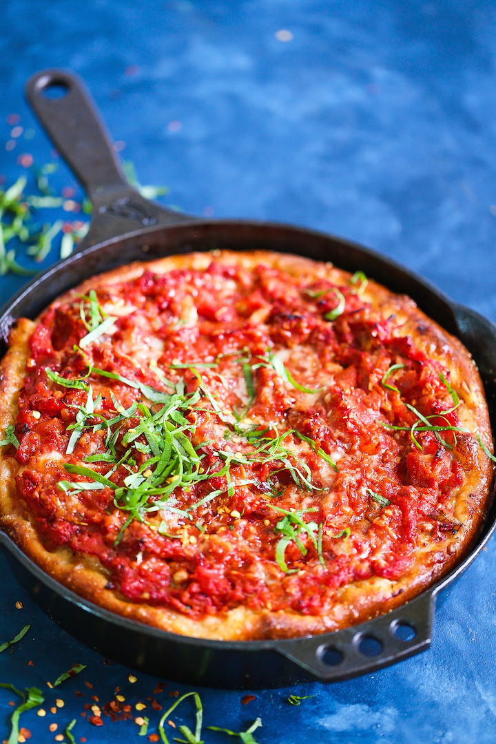 Deep Dish Chicago Style Pizza - Now you don't have to go all the way to Chicago for a deep dish pizza! The crust is perfectly golden brown, the chunky tomato sauce is completely homemade, and a fresh layer of ooey gooey mozzarella cheese is simply the best combination ever!
