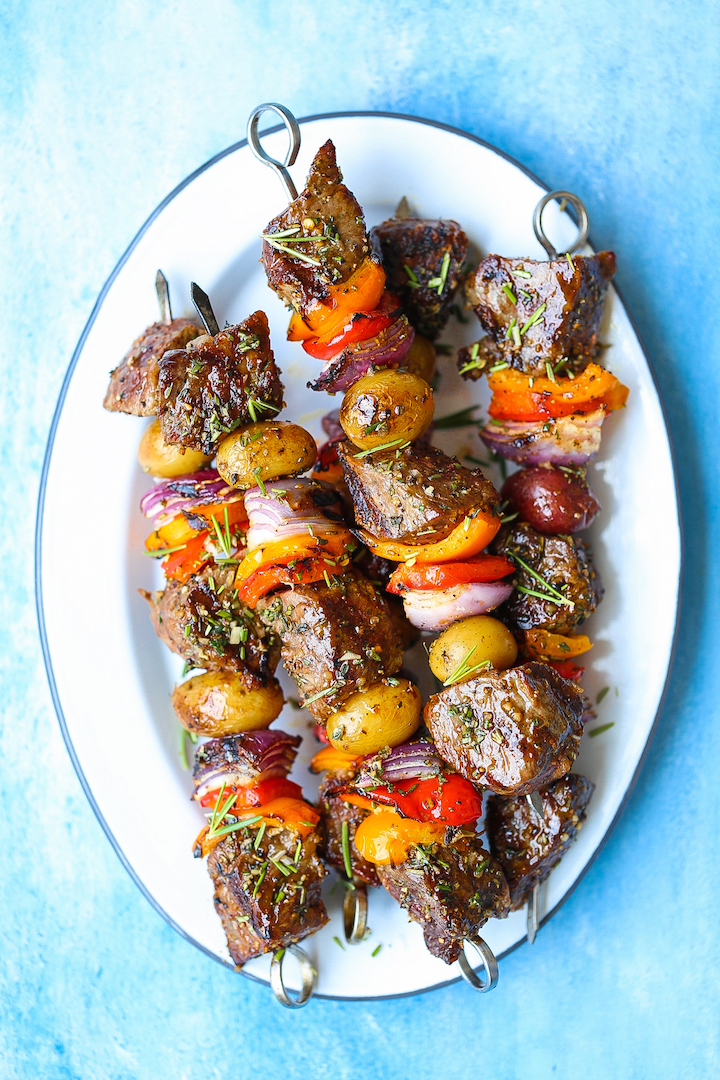 Steak and Potato Kabobs - Everyone's favorite summer meal! The meat comes out so amazingly tender and flavorful with the fresh garlicky-herb mixture!