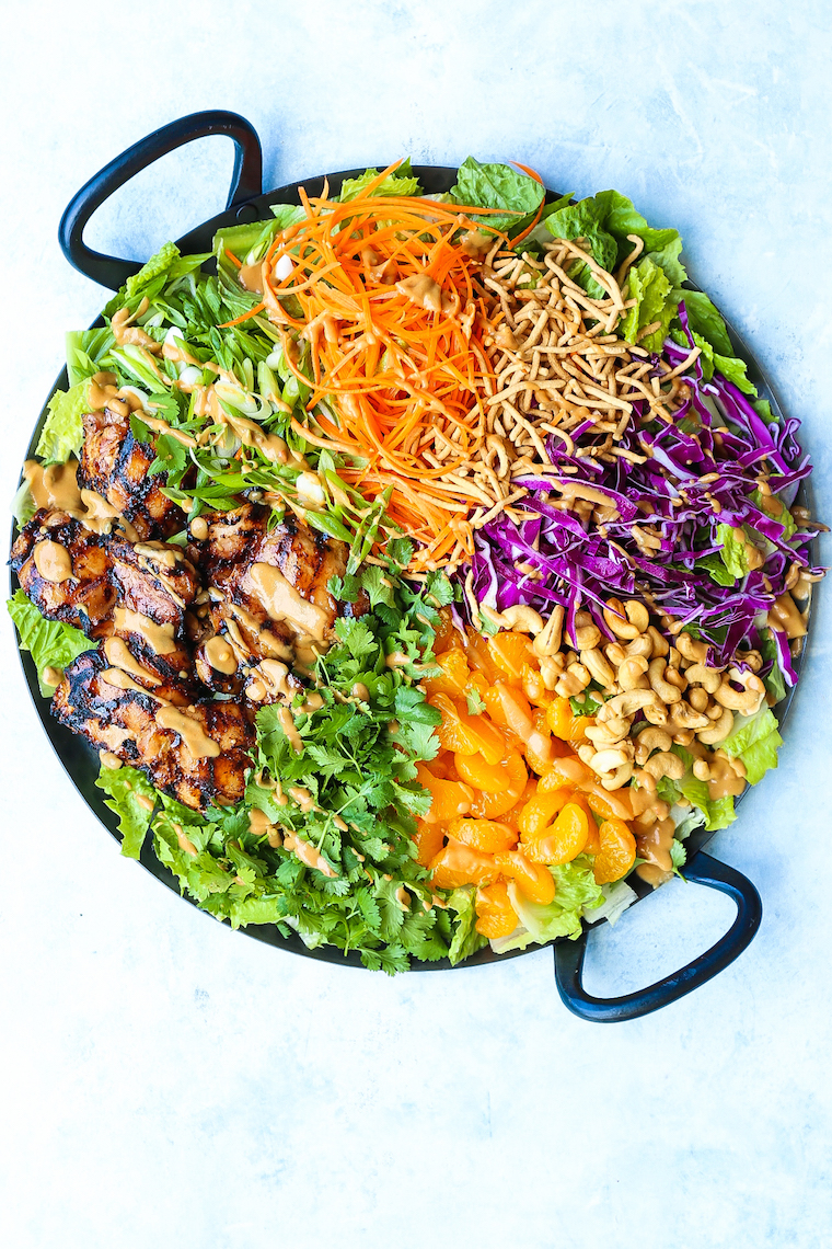 Asian Chicken Salad - With perfectly juicy, tender teriyaki chicken and the most amazing peanut dressing ever! It's quick, simple and perfect for a crowd!