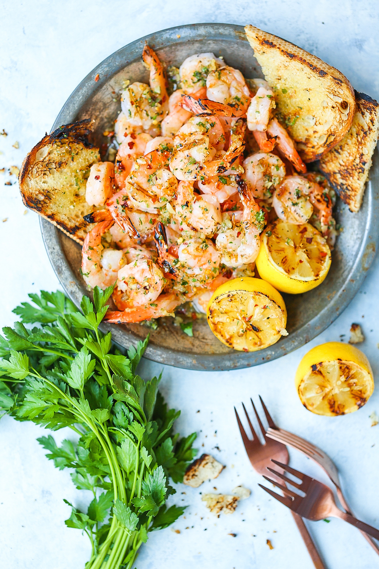 Grilled Garlic Butter Shrimp - The lemon garlic butter sauce is simply perfect! Pair with a glass of wine and crusty bread for the best 30 min meal ever!