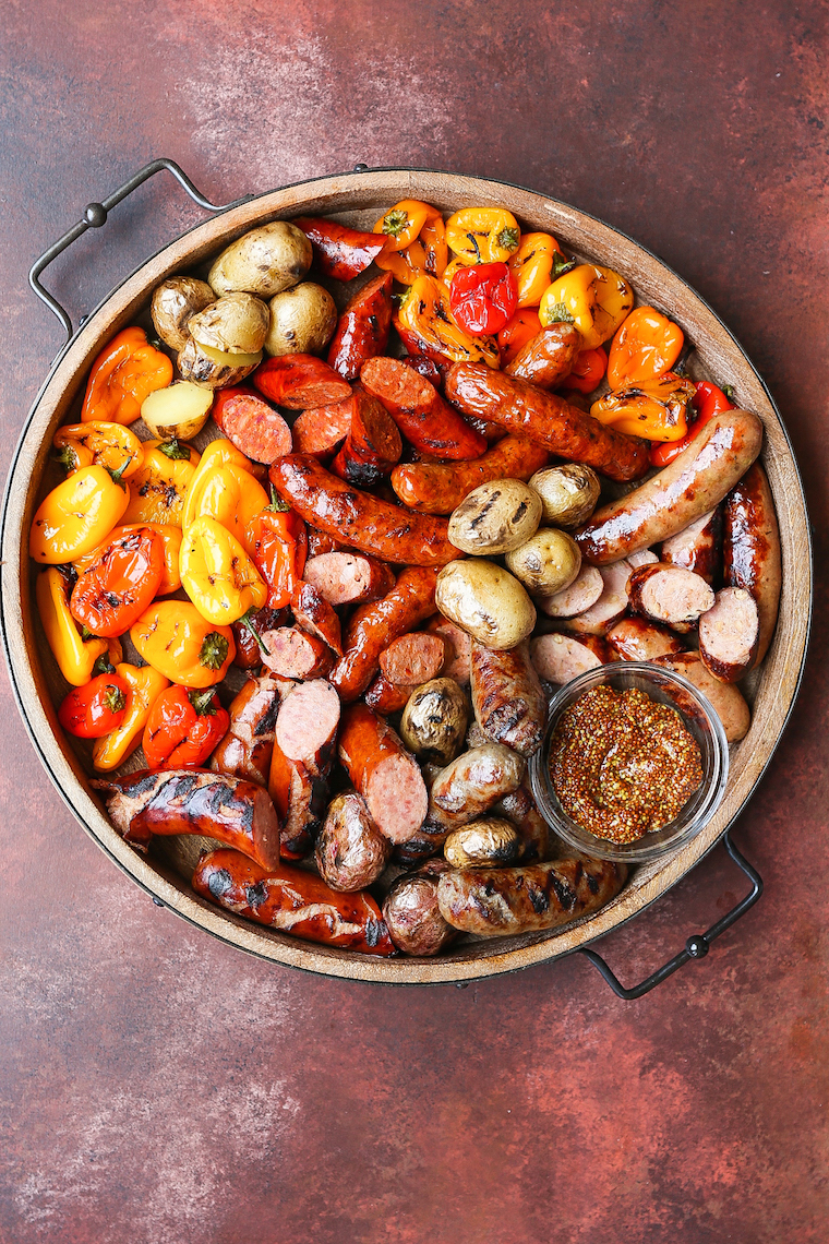 Grilled Sausages, Peppers and Potatoes - The most amazing grilled sausage platter for your next potluck or BBQ! This is easy to prepare and so impressive!