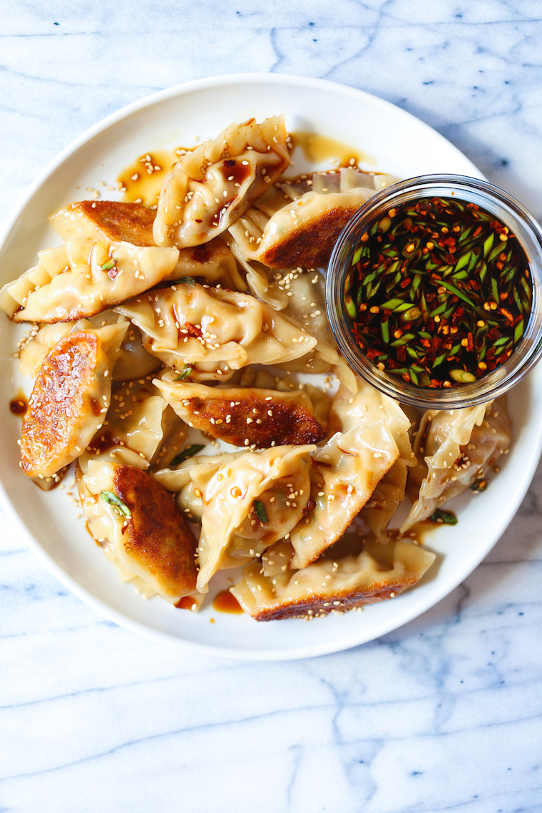 Pork and Kimchi Potstickers - Easy peasy potstickers! Perfectly crispy + a crowd-favorite with an amazing pork-kimchi filling! BONUS: it's freezer-friendly.