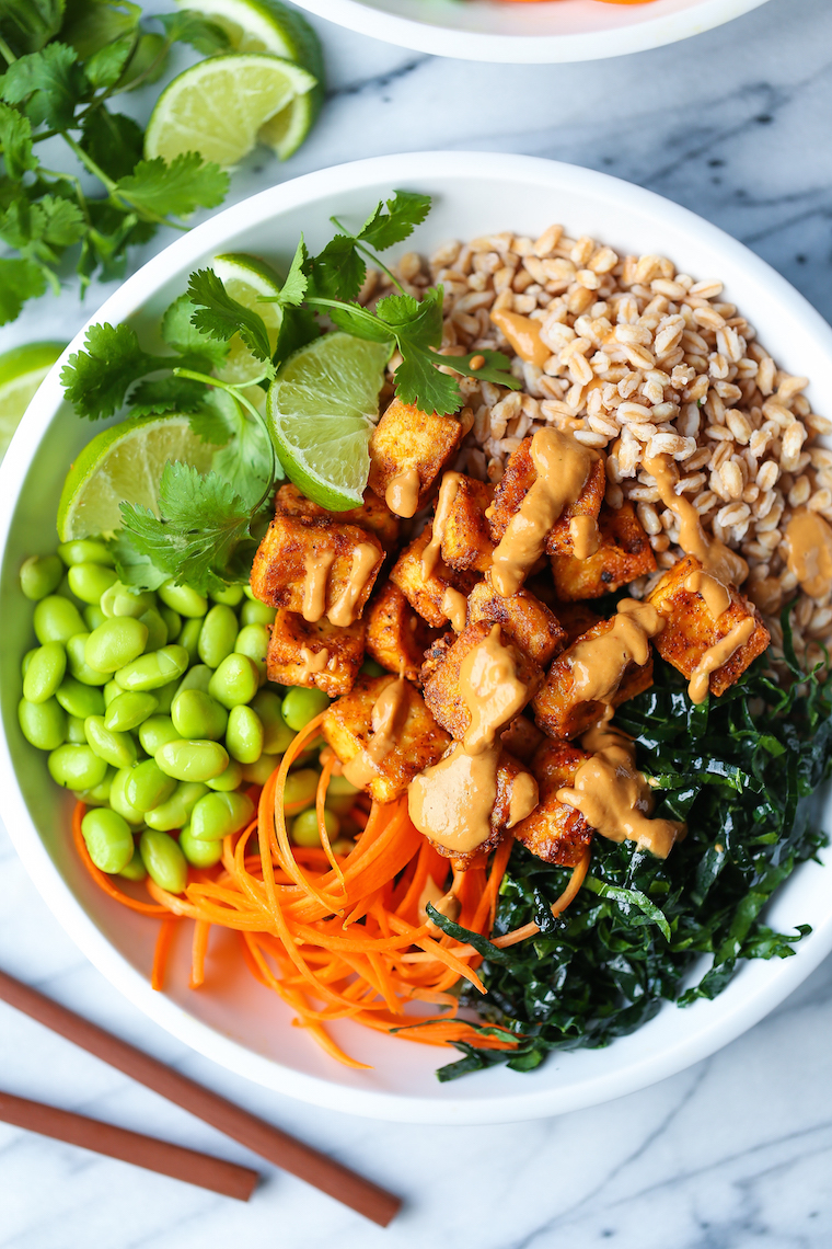 Tofu Power Bowls - Nutritious, flavor-packed veggie power bowls with crispy baked tofu, kale, edamame, carrots + THE BEST creamy peanut sauce of your life!