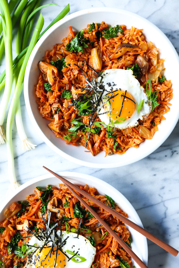 Kimchi Fried Rice - Homestyle fried rice made in just 30 min! Loaded with kimchi, mushrooms, carrots, kale and a fried egg! Sure to be a weeknight favorite!