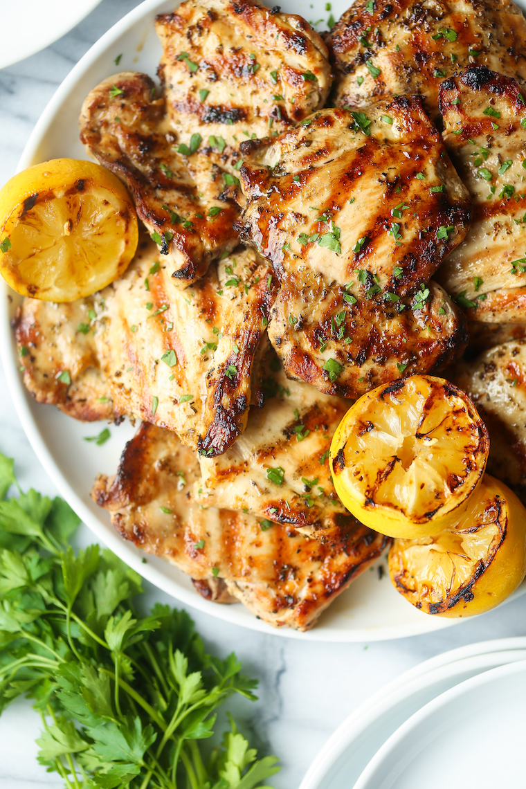 Lemon Garlic Chicken Thighs - Olive oil, lemon juice/zest, garlic, Dijon, oregano, thyme. THE BEST marinade ever. Made on the grill or stovetop. SO SO GOOD.