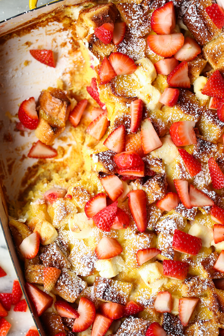 Baked Strawberries and Cream French Toast - The most impressive make-ahead breakfast! So easy with 15min prep. Just pop it right in the oven before serving!