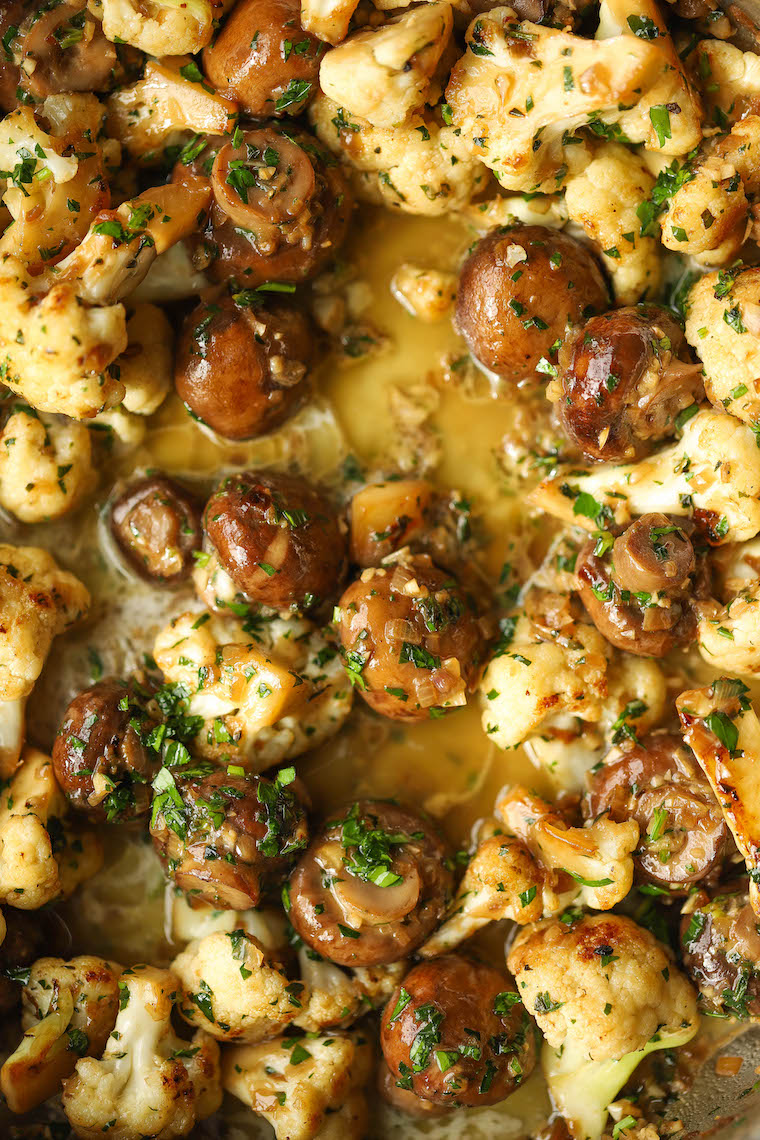 Garlic Butter Mushrooms and Cauliflower - The perfect side dish! Chockfull of veggies, easy to make + loaded with garlicky-buttery goodness!