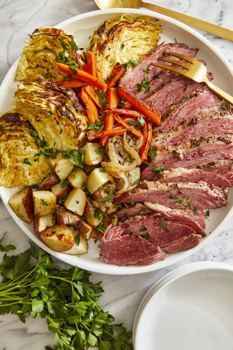 Corned Beef and Cabbage - THE BEST corned beef dinner with cabbage, potatoes and carrots, all roasted to perfection! Best served with mustard.