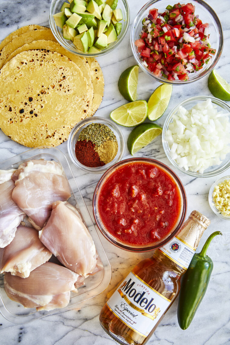 Instant Pot Chicken Tacos - Taco night just got even better (and quicker!) with the juiciest, most flavorful shredded salsa chicken!