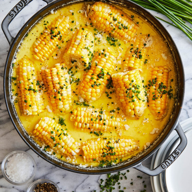 Corn on the Cob boiled in a milk-butter bath and seasoned with chives.