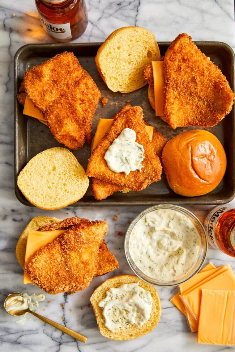 Crispy Fish Sandwiches - Oh-so-crisp fish sandwiches with melted cheese, soft brioche buns and homemade tartar sauce! Just so so good.