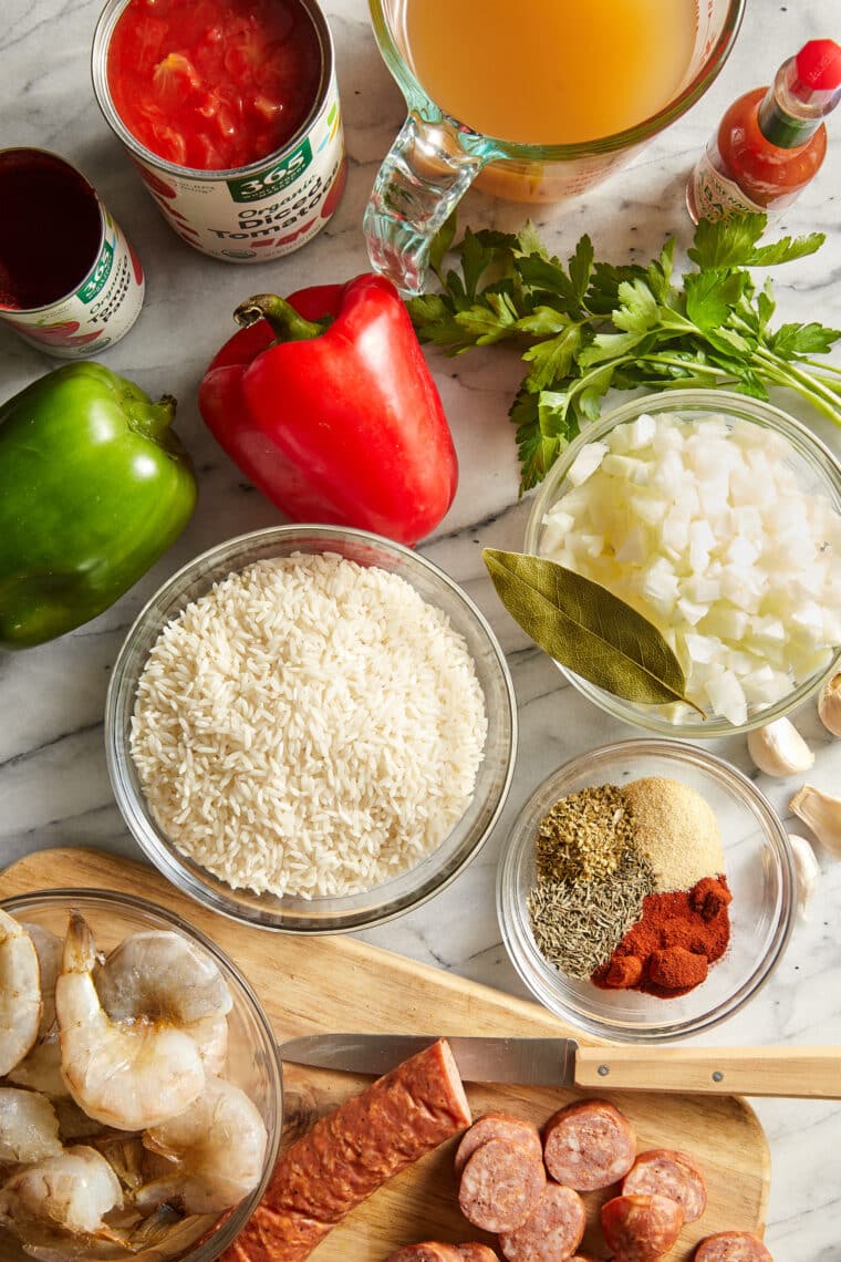 Shrimp and sausage jambalaya simmering in Dutch oven