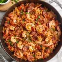 Easy jambalaya recipe with shrimp, sausage, peppers, and rice in one pot