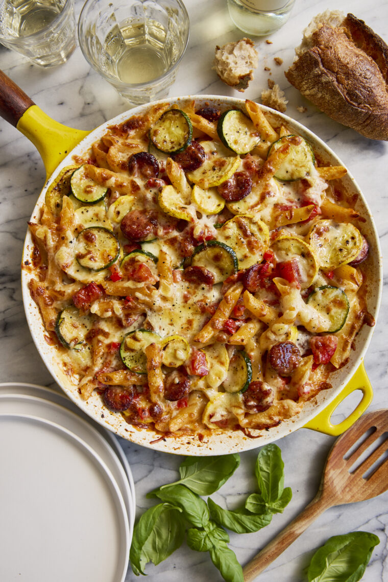 Summer Skillet Pasta - Cheesy baked pasta with the best summer vegetables and andouille sausage! Even your picky eaters will gobble this up!