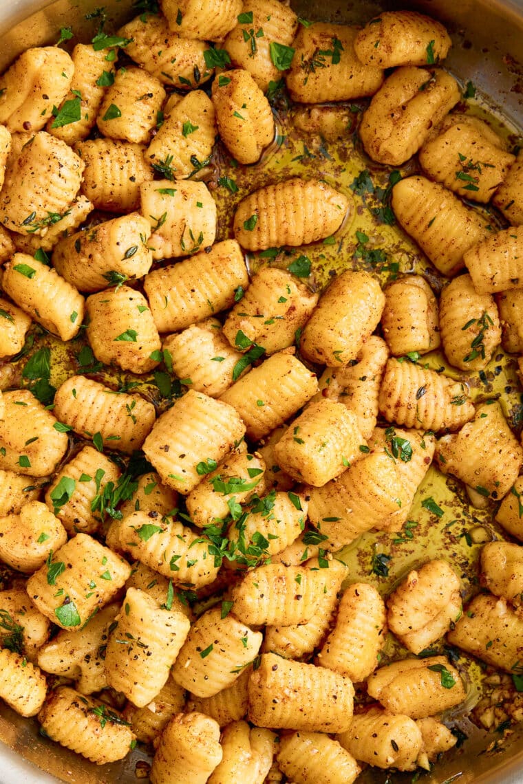 Homemade Gnocchi - Light, pillow-y, fluffy, AND SO EASY to make (just 5 ingredients!). You won't be able to go back to store-bought gnocchi!