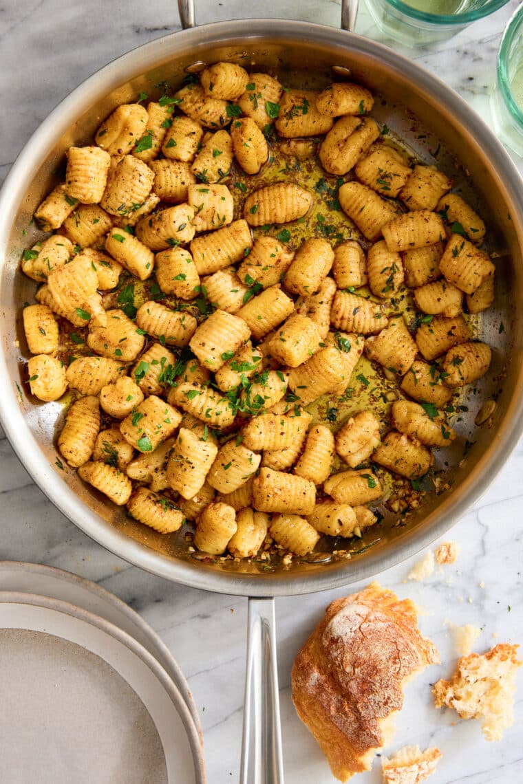 Homemade Gnocchi - Light, pillow-y, fluffy, AND SO EASY to make (just 5 ingredients!). You won't be able to go back to store-bought gnocchi!