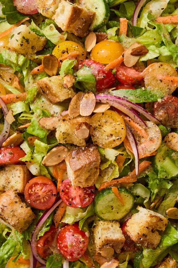 simple side salad in dressing close up